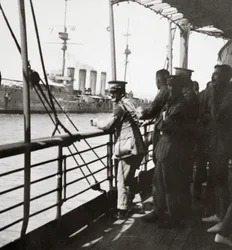 Transport with the Old Contemptibles from India meets a man-of-war in the Mediterranean